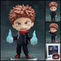 Yuji Itadori JUJUTSU KAISEN chibi action figure with pink hair, black uniform, red hood, cursed energy effects, interchangeable parts, and clear display base.
