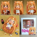 HIMOUTO! UMARU-CHAN Umaru Doma chibi action figure – 10 cm PVC anime figure with orange hamster cloak, snack accessories, cola bottle and interchangeable expressions.